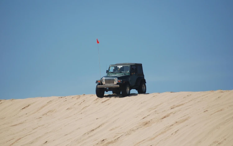 black jeep wrangler in the desert