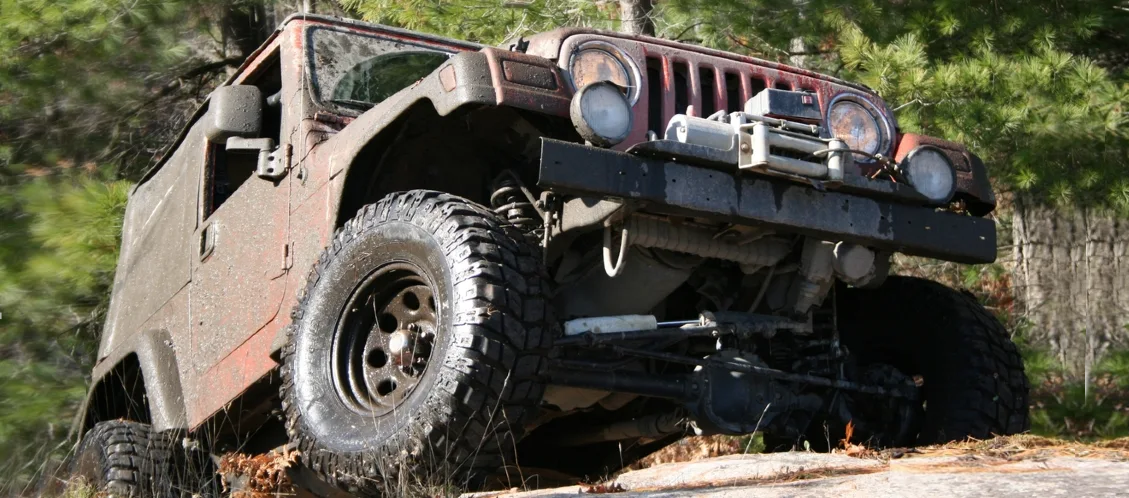 jeep wrangler on a dirt trail